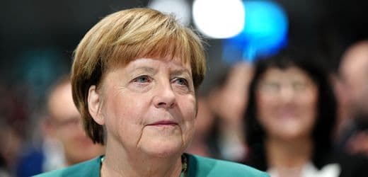 Angela Merkel Defends Coalition Amid Economic Urgency