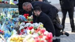 Russian Drone Strikes Kyiv Bridge Amid Surprise Visit by German Chancellor